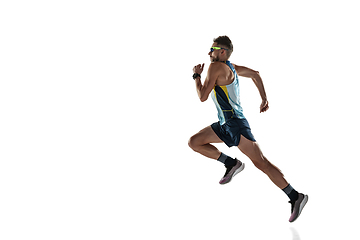 Image showing Triathlon male athlete running isolated on white studio background