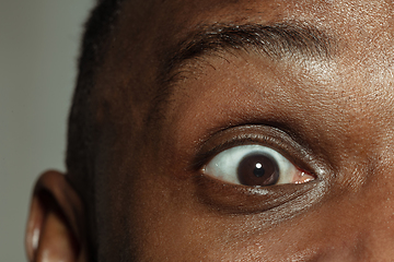 Image showing Close up of face of beautiful african-american young man, focus on eyes