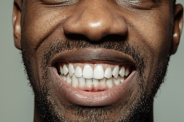 Image showing Close up of face of beautiful african-american young man, focus on mouth