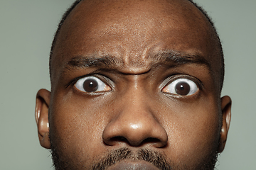 Image showing Close up of face of beautiful african-american young man, focus on eyes