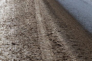 Image showing Dirty snow on the road