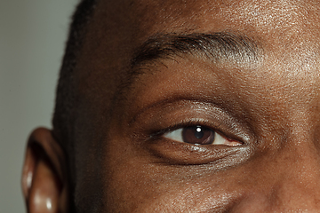 Image showing Close up of face of beautiful african-american young man, focus on eyes