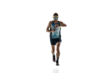 Image showing Triathlon male athlete running isolated on white studio background