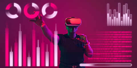 Image showing Woman using interface modern technology and digital layer effect, VR-headset as business, finance, economics strategy concept