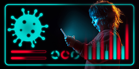 Image showing Boy using interface modern technology and digital layer effect as information of coronavirus pandemic spread