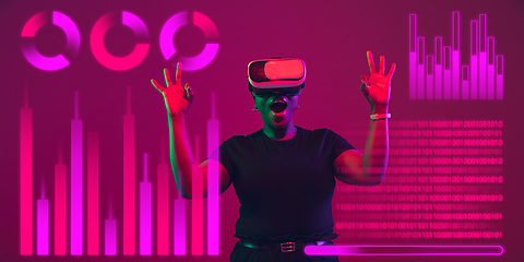 Image showing Woman using interface modern technology and digital layer effect, VR-headset as business, finance, economics strategy concept