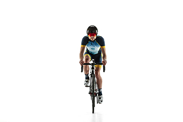 Image showing Triathlon male athlete cycle training isolated on white studio background