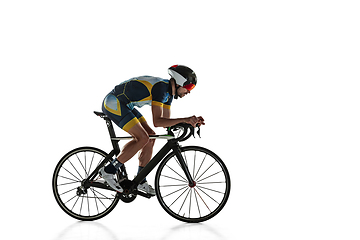 Image showing Triathlon male athlete cycle training isolated on white studio background