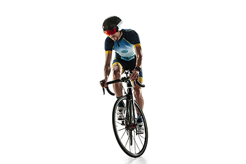 Image showing Triathlon male athlete cycle training isolated on white studio background