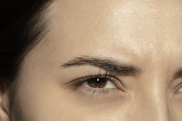 Image showing Close up of face of beautiful caucasian young woman, focus on eyes