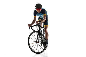 Image showing Triathlon male athlete cycle training isolated on white studio background