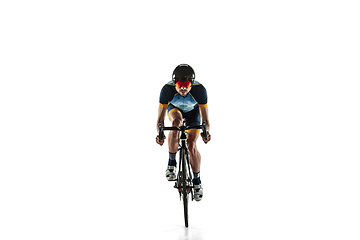 Image showing Triathlon male athlete cycle training isolated on white studio background