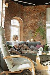 Image showing Caucasian woman, freelancer during the work in home office while quarantine