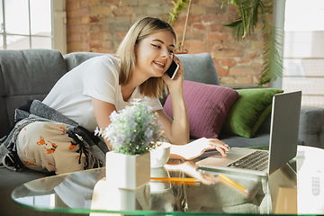 Image showing Caucasian woman, freelancer during the work in home office while quarantine