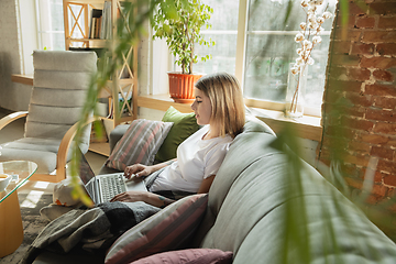 Image showing Caucasian woman, freelancer during the work in home office while quarantine