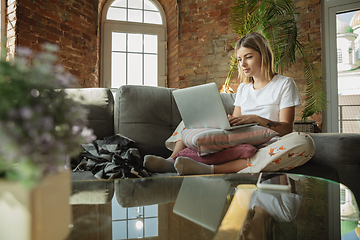 Image showing Caucasian woman, freelancer during the work in home office while quarantine