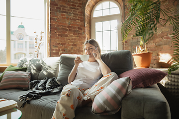 Image showing Caucasian woman, freelancer during the work in home office while quarantine