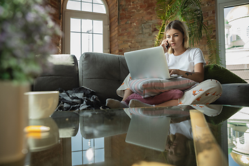 Image showing Caucasian woman, freelancer during the work in home office while quarantine