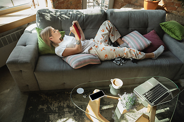 Image showing Caucasian woman, freelancer during the work in home office while quarantine