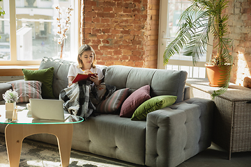 Image showing Caucasian woman, freelancer during the work in home office while quarantine