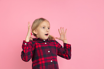 Image showing Caucasian little girl\'s portrait on pink studio background