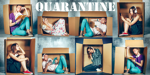 Image showing People at quarantine because of coronavirus spreading - sitting inside little boxes, staying home concept