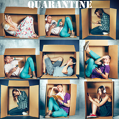 Image showing People at quarantine because of coronavirus spreading - sitting inside little boxes, staying home concept