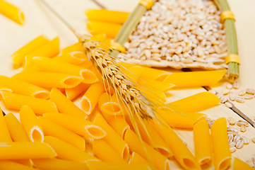 Image showing Italian pasta penne with wheat