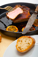 Image showing pork chop seared on iron skillet