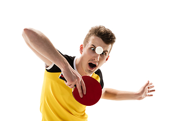 Image showing Funny emotions of professional tablet tennis player isolated on white studio background, excitement in game