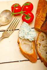 Image showing fresh blue cheese spread ove french baguette