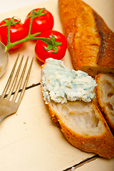 Image showing fresh blue cheese spread ove french baguette