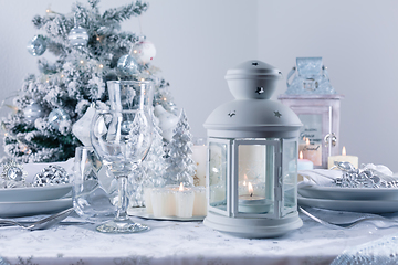 Image showing Festive Christmas table in snowy white