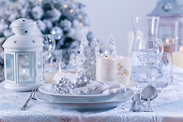 Image showing Festive Christmas table in snowy white