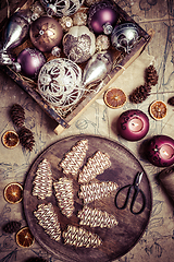 Image showing Christmas cookies in tree shape with ornaments in vintage style