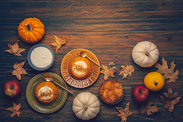 Image showing Homemade small pumpkin pies with icing for Thanksgiving