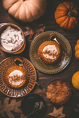 Image showing Homemade small pumpkin pies with icing for Thanksgiving