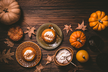 Image showing Homemade small pumpkin pies with icing for Thanksgiving