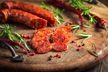 Image showing Red Spanish chorizo sausage with herbs and spices 