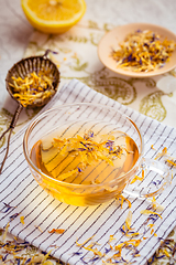 Image showing Cup of herbal tea with lemon
