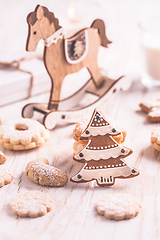 Image showing Homemade Christmas gingerbread and cookies with Christmas balls 