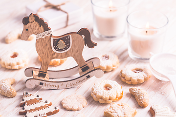 Image showing Homemade Christmas gingerbread and cookies with Christmas balls and ornaments