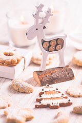 Image showing Homemade Christmas gingerbread and cookies with Christmas balls and ornaments