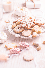 Image showing Homemade Christmas gingerbread and cookies with Christmas balls and ornaments