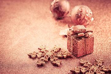 Image showing Christmas glitter background with ornaments and present box 