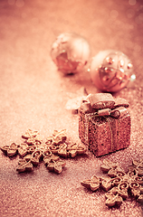 Image showing Christmas glitter background with ornaments and present box 