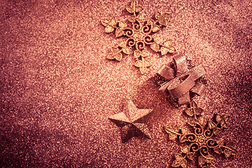 Image showing Christmas glitter background with ornaments and present box 