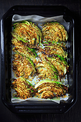 Image showing Baked savoy cabbage with parmesan cheese, honey and spices