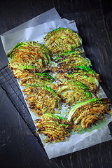 Image showing Baked savoy cabbage with parmesan cheese, honey and spices