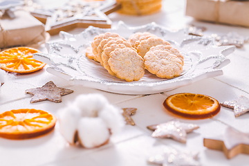 Image showing Christmas cookies with orange slices, ornaments on white background